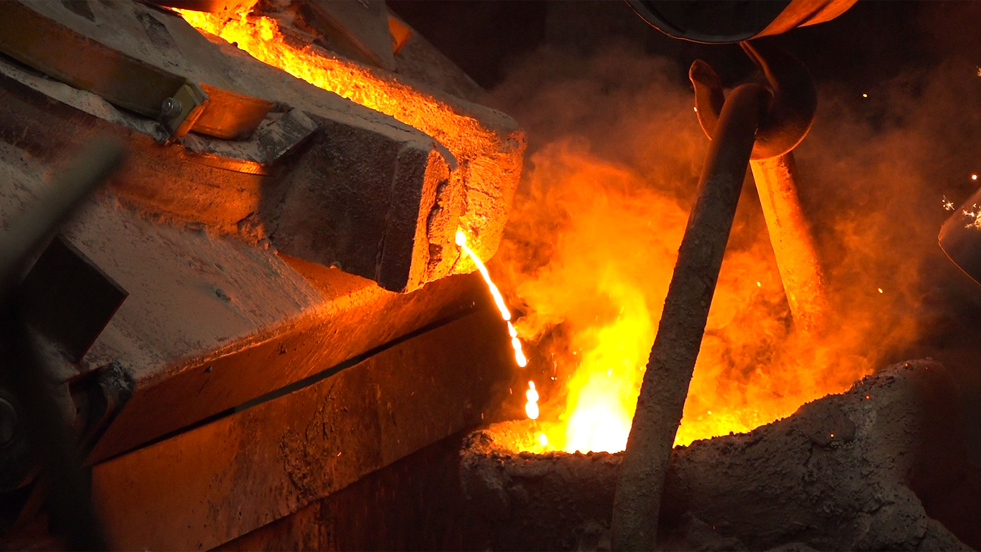 Closeup Of Molten Metal Being Poured.